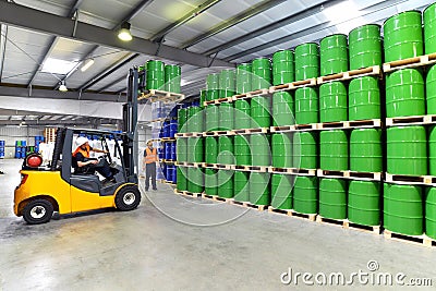 Group of workers in the logistics industry work in a warehouse w Stock Photo