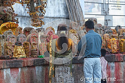 Group of yellow monuments with red dots in Shiva temple, Kanchipuram, Tamil Nadu Editorial Stock Photo
