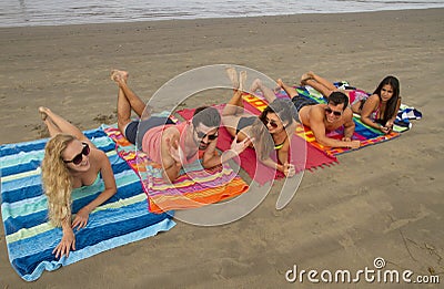 Group of Young Adults at the Beach Stock Photo