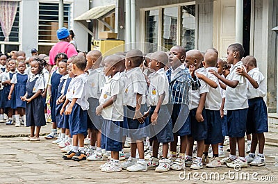 Group of young African pre school children dancing and singing in school courtyard, Matadi, Congo, Central Africa Editorial Stock Photo