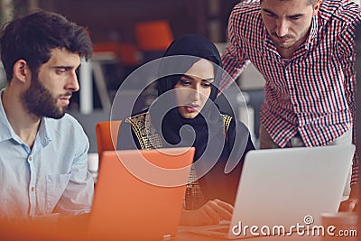 Group Young Coworkers Making Great Business Decisions.Creative Team Discussion Corporate Work Concept Modern Office. Stock Photo