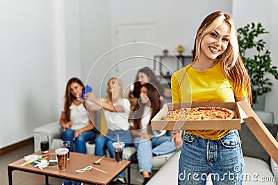 Group of young friends woman having party sitting on the sofa Stock Photo