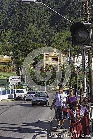 A group of young girls walk home from school in Maraval, Trinidad Editorial Stock Photo