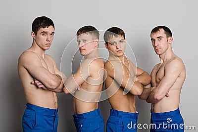 Group of young guys with muscular bodies Stock Photo