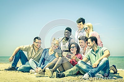 Group of young hipster best friends with digital tablet Stock Photo