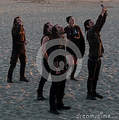 Group of young people in goth clothing looking up Editorial Stock Photo