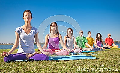 Group of young people have meditation on yoga class. Stock Photo