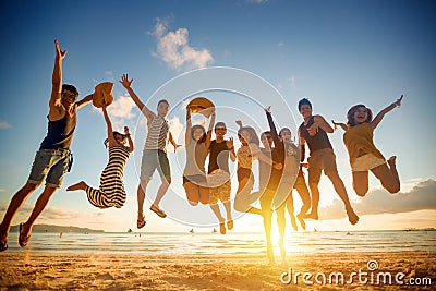 Group of young people jumping Stock Photo