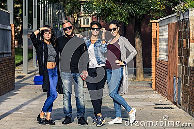 Group of young people standing on the ghetto street. Stock Photo