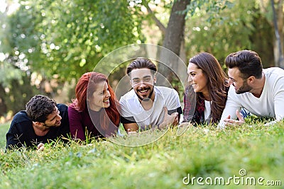 Group of young people together outdoors in urban background Stock Photo