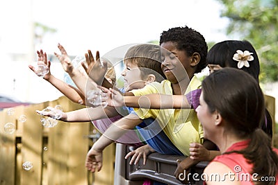 Group of young preschool children playing Stock Photo