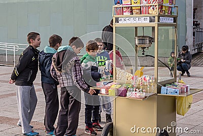 group of youngsters, boys, Serbs, waiting in line in the streets of Valjevo in front of a popcorn stand, or Kocice, Editorial Stock Photo