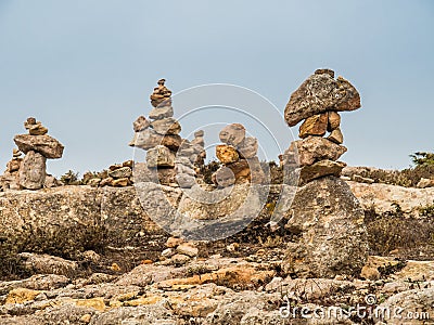 Grouping stones as a symbol of knowledge and desire to return. Stock Photo