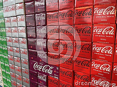 Coca Cola 12 pack side view variety display Sprite Cherry Coke in a grocery store Editorial Stock Photo