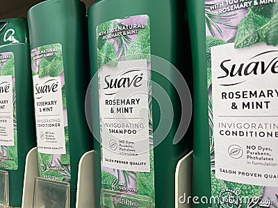 Hair Care products on a retail store shelf Suave green bottle Editorial Stock Photo