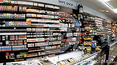 smoke shop interior wall of products Editorial Stock Photo