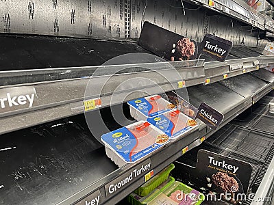 Walmart retail store empty meat market shelves few packs Editorial Stock Photo