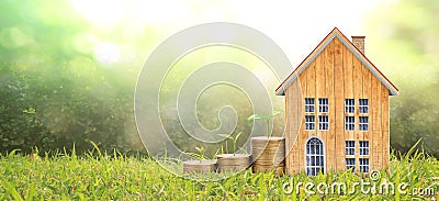 Growing coins house on stack coins. Concept of Investment propert Stock Photo