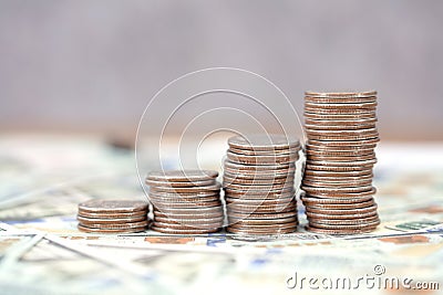 Growing dollar coins on money Stock Photo