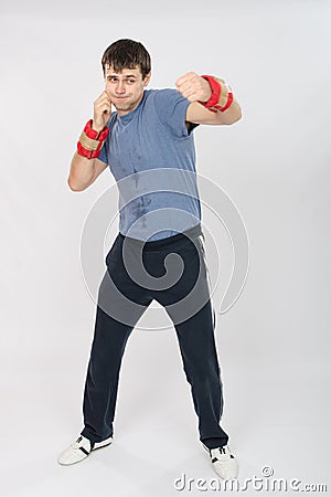 Growth portrait of a boxer in training worked punches Stock Photo