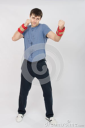 Growth portrait of boxer worked blows with weighting Stock Photo