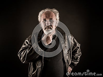 Grumpy senior man Stock Photo