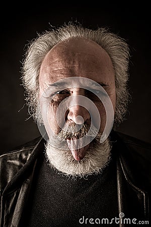 Grumpy senior man Stock Photo