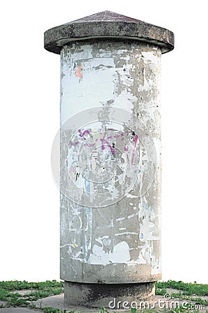 Grunge advertising pillar and grass Stock Photo