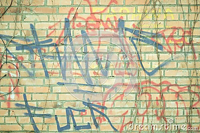 Grunge background graffitti on the brick wall Stock Photo