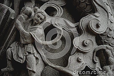 Grunge background with stone texture and bas-relief with ancient ornament Stock Photo