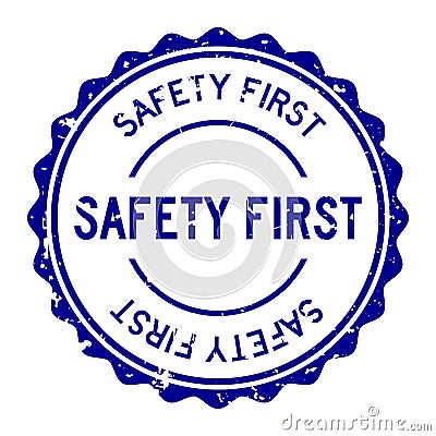 Grunge blue safety first word round rubber stamp on white background Stock Photo