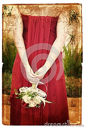 Grunge bride in red silk dress Stock Photo