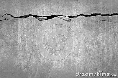 Grunge concrete cement wall with crack in industrial building, great for your design Stock Photo