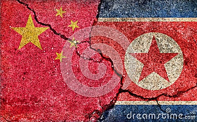 Grunge country flag illustration cracked concrete background / China vs North korea Political or economic conflict Cartoon Illustration