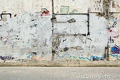 Grunge graffiti painted wall and sidewalk. Street style background and empty copy space. Editorial Stock Photo