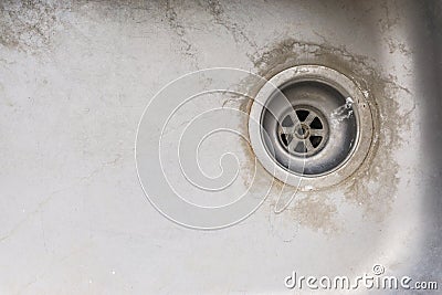 Grunge old dirty metal rusty sink drain background Stock Photo