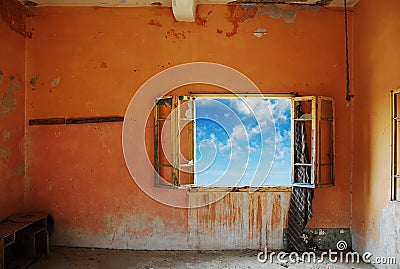 Grunge room with a beautiful blue sky outdoors Stock Photo