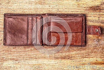 Grunge wallet on wooden background Stock Photo