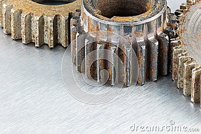 Grunge weathered rusty industrial metal gears macro Stock Photo