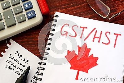 GST / HST written in a note. Stock Photo