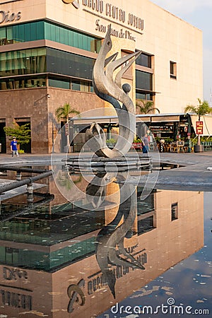 Guadalajara, Jalisco / Mexico - May 26, 2021: Sculpture of a snake in the Plaza TapatÃ­a representing the immolation of the Editorial Stock Photo