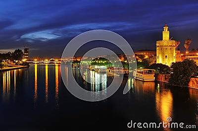 Guadalquivir River and the Torre del Oro in Sevile Stock Photo