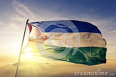 Guanacaste Province of Costa Rica flag textile cloth fabric waving on the top sunrise mist fog Stock Photo