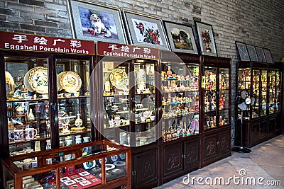 Guangdong, a famous tourist attraction in China, sells shops of folk arts and crafts in Chen Clan Academy Editorial Stock Photo