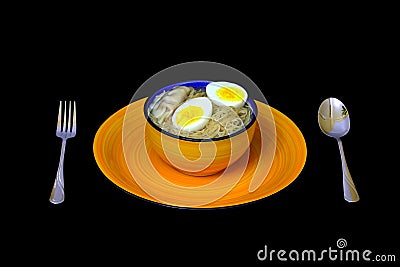 Traditional wonton noodles with soup in a porcelain bowl with spoon and fork on the side Stock Photo