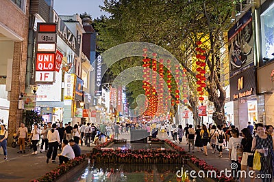 Beijing Lu. Shopping street in Guangzhou. The street is full of shops and shopping centres. People walk in the evening Editorial Stock Photo