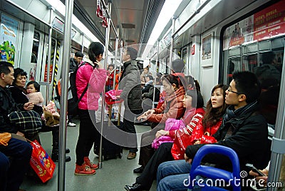 Guangzhou china: take the subway passengers Editorial Stock Photo