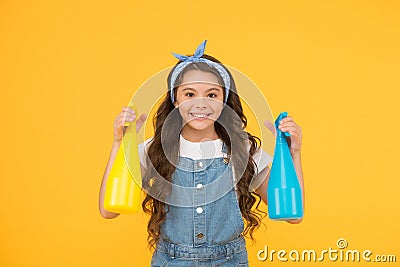 On guard of cleanliness. Cleaning twice faster. Mist sprayer for wiping dust. Girl ready for cleaning. Household duties Stock Photo