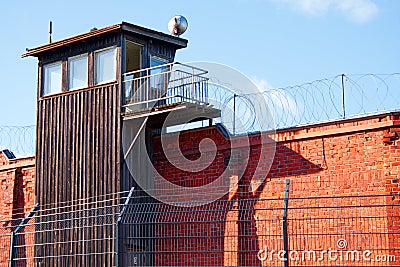 A guard tower on prison wall Stock Photo