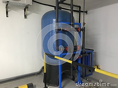 Guarded reverse osmosis plant set up for drinking water supply for an renowned hotel rooms and set up connected with plumbing work Stock Photo